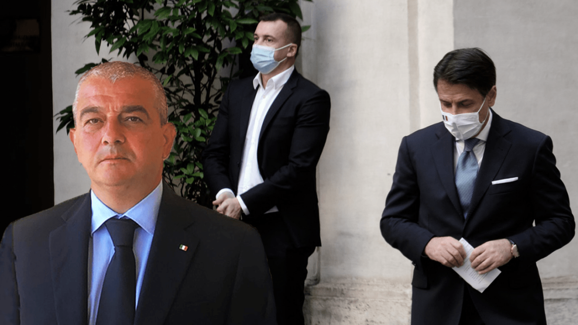Sen. Fazzolari (FdI) Il senatore Giovan Battista Fazzolari di Fratelli d'Italia con dietro il premier Conte e Rocco Casalino